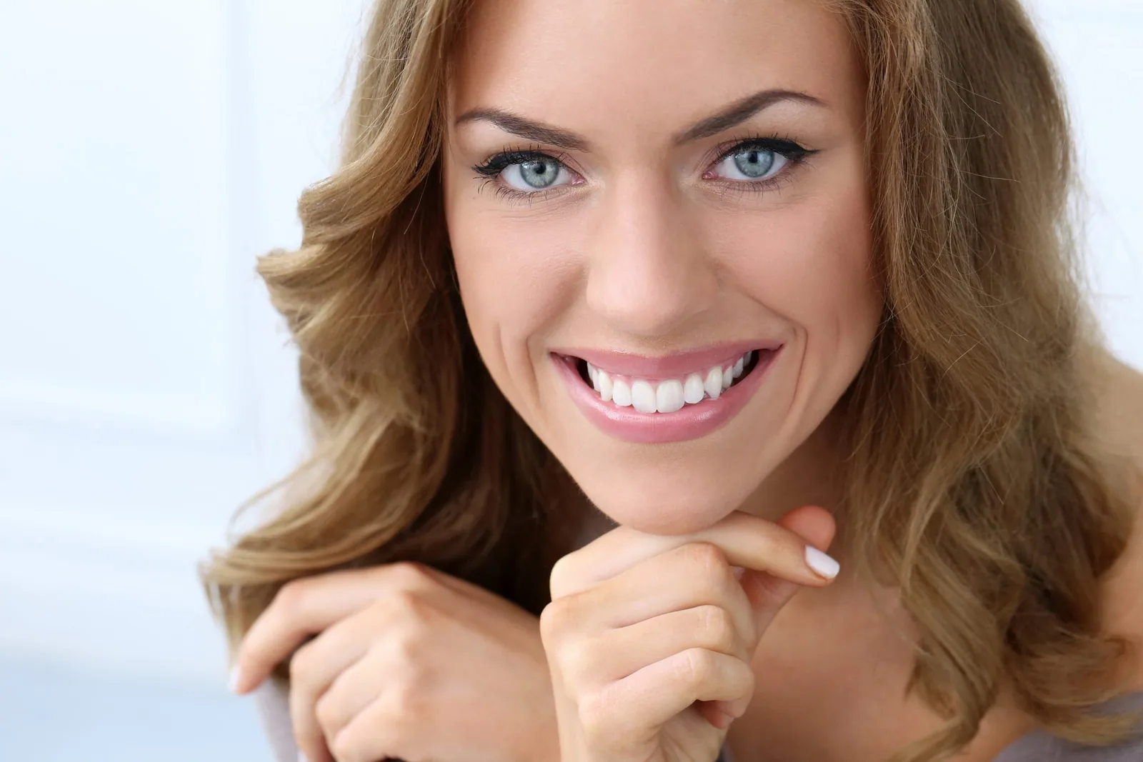 A patient smiling after restorative dental care